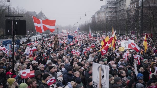 Protesters with Danish and Greenlandic flags during a demonstration in Copenhagen, Denmark, on Saturday, Jan. 17, 2026. Thousands of people took to the streets across Denmark to protest US President Donald Trump's ambitions to take control of Greenland, underscoring the deep unease over the future o