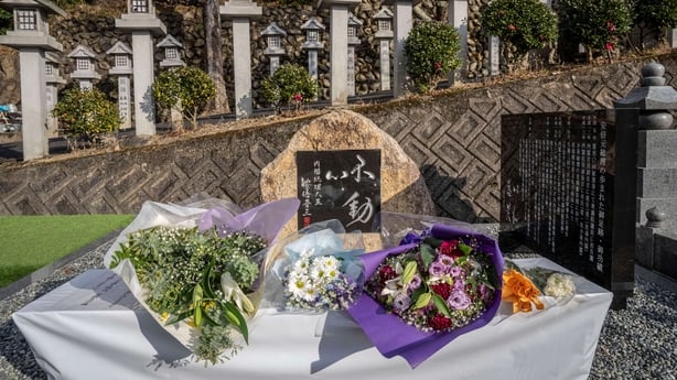Flowers laid at a memorial 