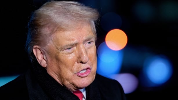 Donald Trump speaks to members of the media 