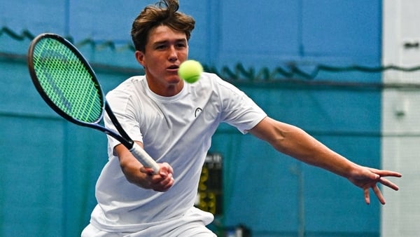 Eoghan Jennings in action against James McGloughlin in their under-18 boys singles final match during the William Fry Junior Lawn Tennis Championships of Ireland at Fitzwilliam Lawn Tennis Club in Dublin.