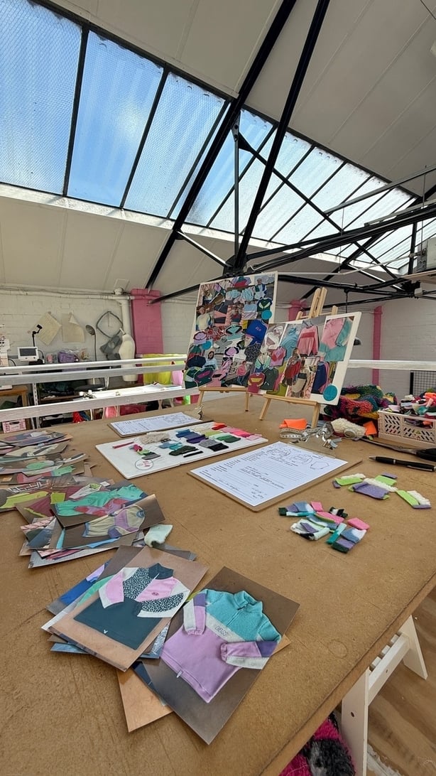 A design studio with mock ups on a work table