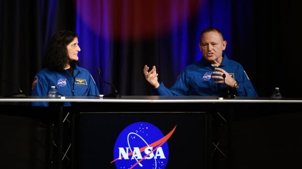 NASA astronauts Suni Williams (L) and Butch Wilmore answer questions