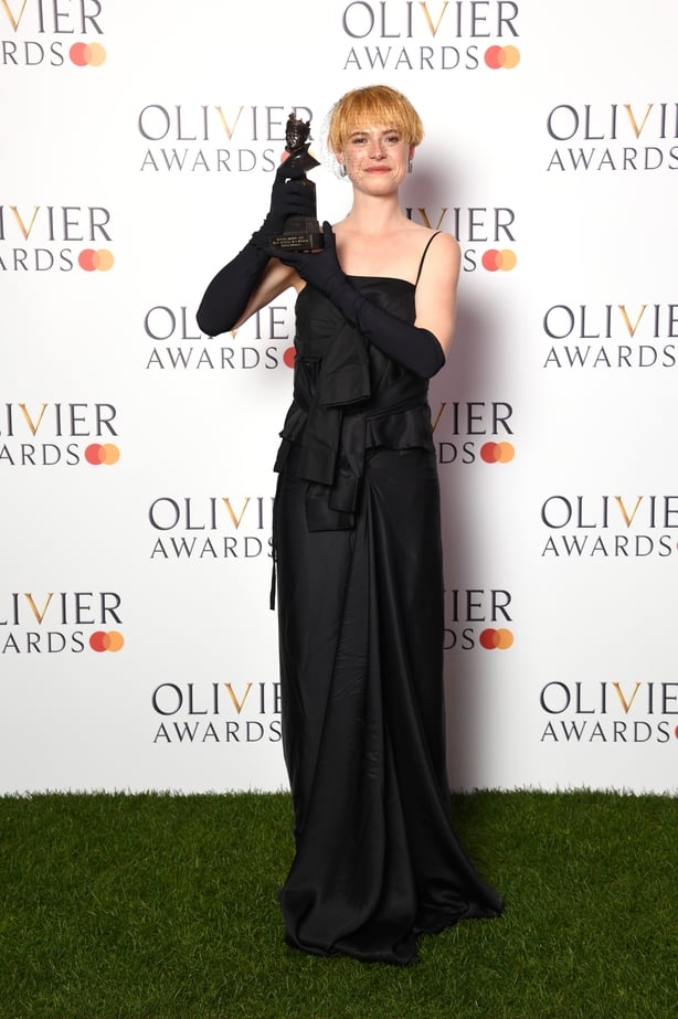 LONDON, ENGLAND - APRIL 10: Jessie Buckley, winner of the Best Actress in a Musical award for "Cabaret at the Kit Kat Club", poses in the winner's room during The Olivier Awards 2022 with MasterCard at the Royal Albert Hall on April 10, 2022 in London, England. (Photo by Gareth Cattermole/Getty Imag