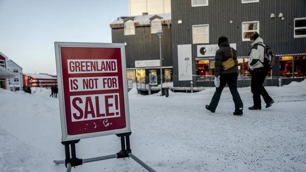 A sign reading "Greenland is not for sale!" is seen in Nuuk, Greenland