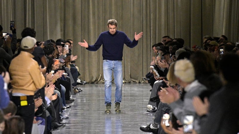 Fashion designer Jonathan Anderson acknowledges the applause of the audience during the Dior Homme Menswear Fall/Winter 2026-2027