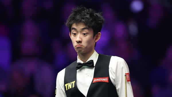 Wu Yize of China reacts during his Quarter Final match against Xiao Guodong of China during day six of the Johnstone's Paint Masters at Alexandra Palace on January 16, 2026 in London, England.