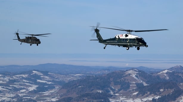 IN FLIGHT - JANUARY 21: Blackhawk helicopters, part of the U.S. Marine Corps HMX presidential helicopter squadron, travels between Zurich and Davos on its way to the World Economic Forum on January 21, 2026 near Liechtenstein. The annual meeting of political and business leaders comes amid rising te