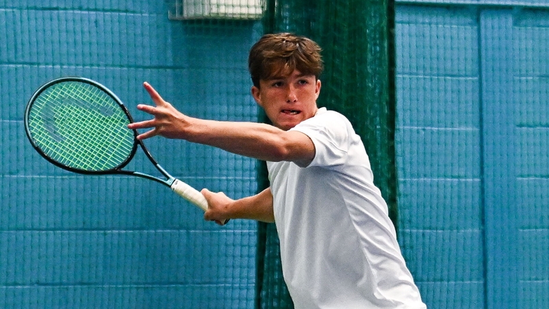 Eoghan Jennings in action against James McGloughlin in their under-18 boys singles final match during the William Fry Junior Lawn Tennis Championships of Ireland at Fitzwilliam Lawn Tennis Club in Dublin