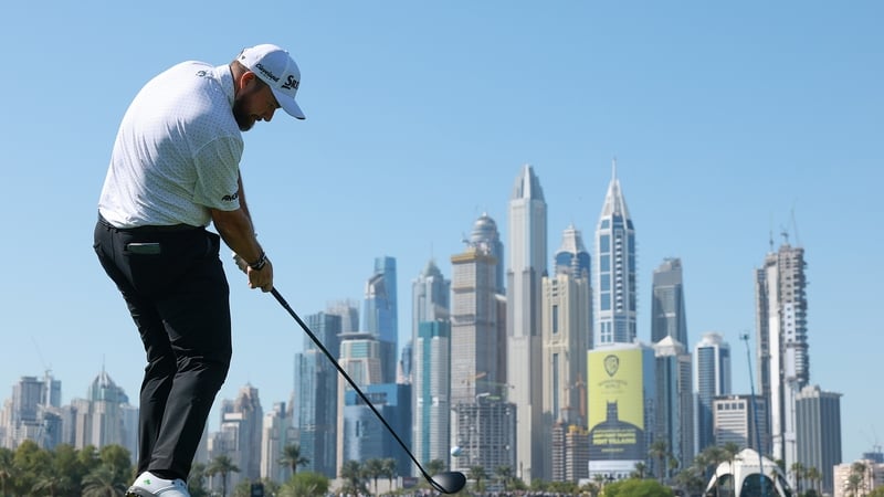 Shane Lowry tees off at the famous eighth hole at Emirates GC