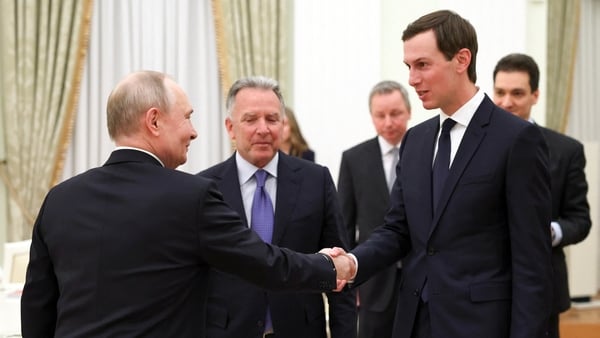 In this pool photograph distributed by the Russian state agency Sputnik, Russia's President Vladimir Putin welcomes US special envoy Steve Witkoff and US President Donald Trump's son-in-law Jared Kushner during a meeting at the Kremlin in Moscow on Januar