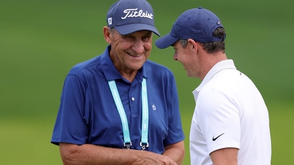 Rory McIlroy of Northern Ireland speaks with Bob Rotella prior to the PGA Championship at Quail Hollow Country Club on May 13, 2025 in Charlotte, North Carolina.
