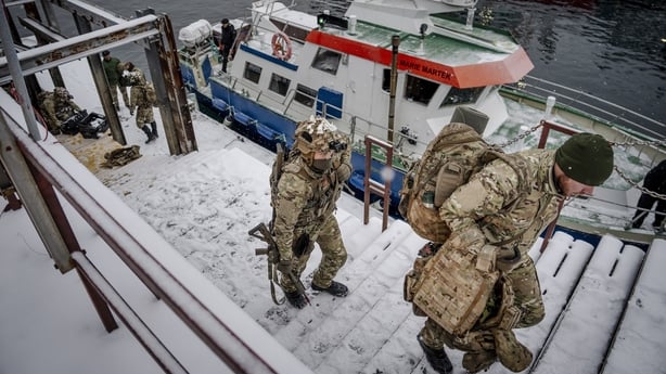 Danish soldiers disembark at the port in Nuuk, Greenland