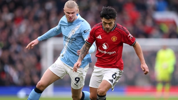 Lisandro Martinez up against Erling Haaland during the recent Manchester derby