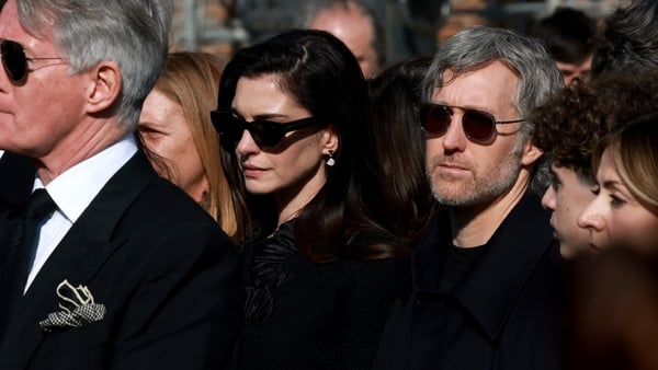 Anne Hathaway attends the funeral of Valentino Garavani