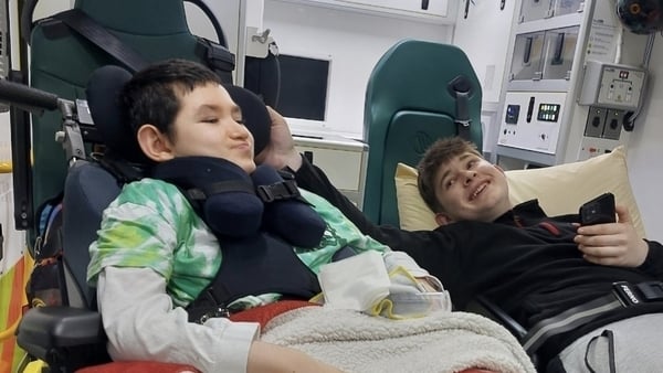 Two boys are seen in an ambulance