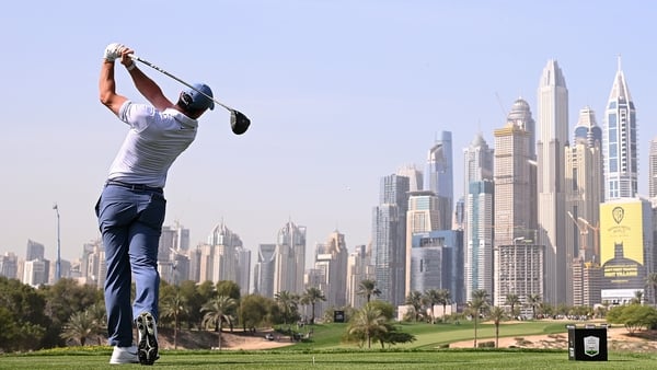 Rory McIlroy tees off on the eighth hole during the third round at Emirates Golf Club