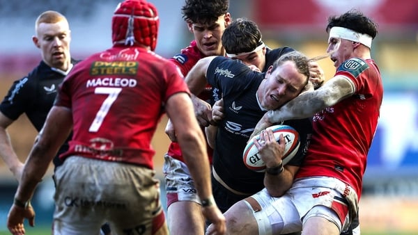 24 January 2026; Werner Kok of Ulster is tackled by Tom Rogers of Scarlets during the United Rugby Championship match between Scarlets and Ulster at Parc Y Scarlets in Llanelli, Wales. Photo by Chris Fairweather/Sportsfile