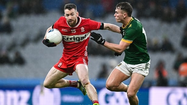  Niall Loughlin of Derry in action against Cathal Hickey of Meath - 2026 Allianz Football League