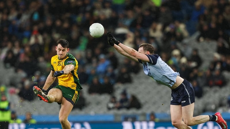 Michael Langan of Donegal in action against Eoin Kennedy of Dublin - 2026 Allianz Football League