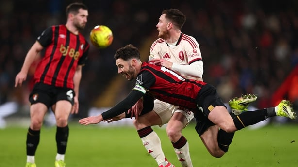 BOURNEMOUTH, ENGLAND - JANUARY 24: Andrew Robertson of Liverpool fouls Adam Smith of Bournemouth during the Premier League match between Bournemouth and Liverpool at Vitality Stadium on January 24, 2026 in Bournemouth, England. (Photo by Shaun Brooks - CameraSport via Getty Images)