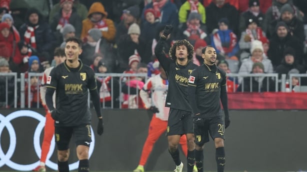 Han-Noah Massengo (C) of Augsburg