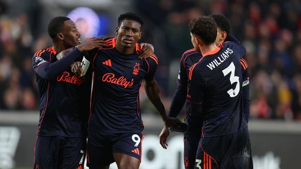 Taiwo Awoniyi of Nottingham Forest celebrates with teammates after scoring a goal to make it 0-2 during the Premier League match between Brentford and Nottingham Forest at Gtech Community Stadium on January 25, 2026 in Brentford, England.