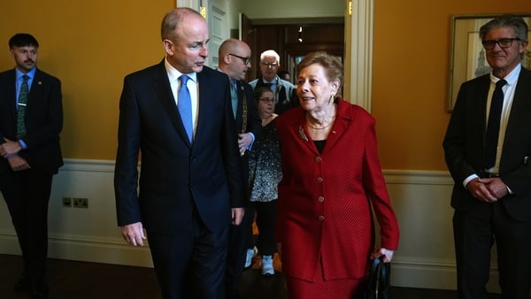 Taoiseach Micheal Martin (left) with Holocaust survivor Suzi Diamond as they attend a Holocaust Memorial Day Commemoration at the Royal Hospital Kilmainham in Dublin