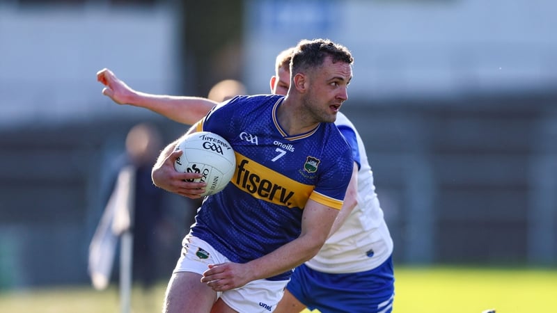 5 April 2025; Cian Smith of Tipperary in action against Michael O'Brien of Waterford during the Munster GAA Football Senior Championship quarter-final match between Tipperary and Waterford at FBD Semple Stadium in Thurles, Tipperary. Photo by David Ribeir