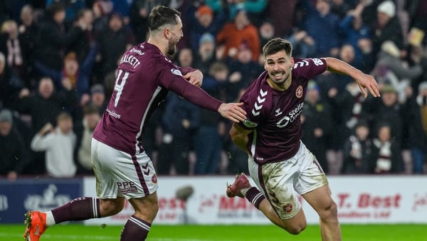 Claudio Braga (R) of Hearts celebrates with Craig Halkett after he scores the second goal during the William Hill Premiership match between Heart of Midlothian and Celtic at Tynecastle Park on January 25, 2026 in Edinburgh, Scotland.
