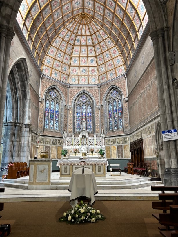 A coffin inside the church at a funeral mass
