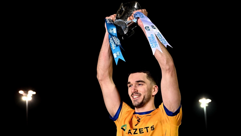12 February 2025; DCU Dóchas Éireann captain Ciarán Caulfield lifts the cup after his side's victory in the Electric Ireland Higher Education GAA Sigerson Cup final match between UCD and DCU DÉ at the GAA Connacht Centre of Excellence in Bekan, Mayo. Phot