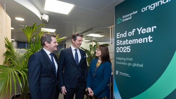 Two men and a woman pictured an Enterprise Ireland end of year and jobs announcement event