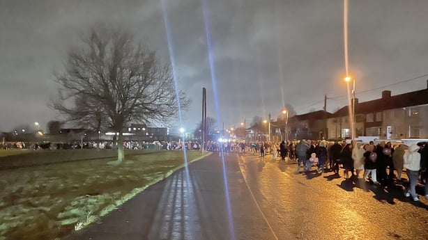 Members of the public join Siobhan Lynch, the mother of a teenage girl who died after a scrambler crash in north Dublin, take part in a walk 