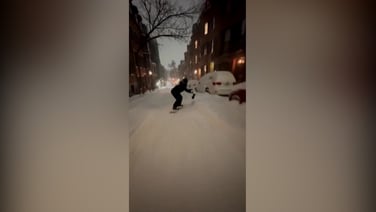 Skier and snowboarder turn snow-covered Boston into a playground