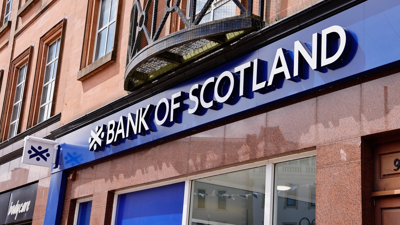 Bank of Scotland signage outside a bank branch on a street