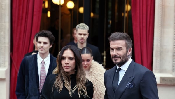 British fashion designer and her footballer husband