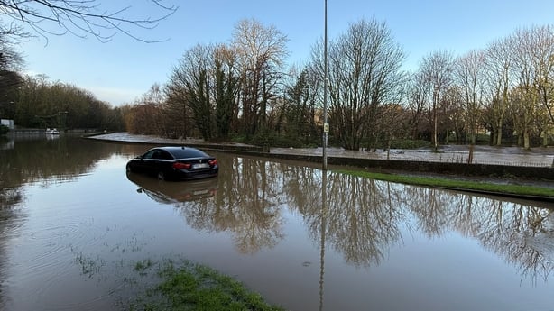 a car is seen in floodwaters in dublin during a storm