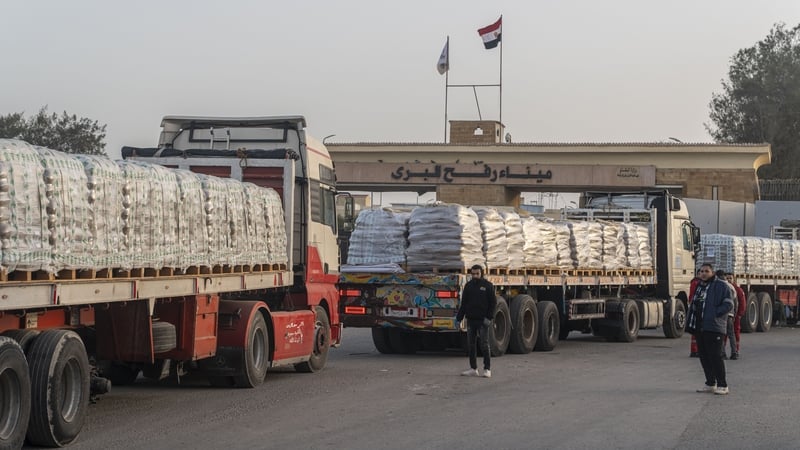 Trucks carrying aid enters Gaza through the border crossing in Rafah, Egypt