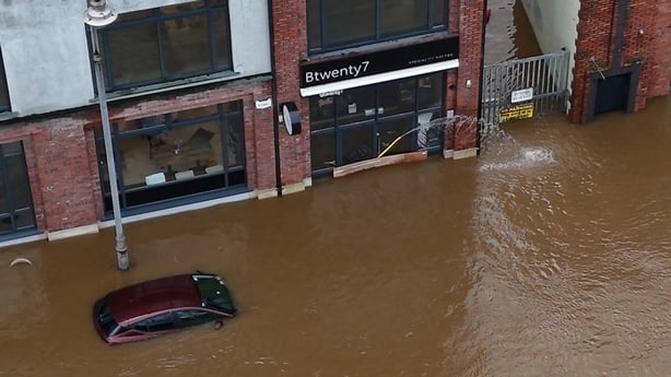 A car is engulfed in floodwater in Enniscorthy 