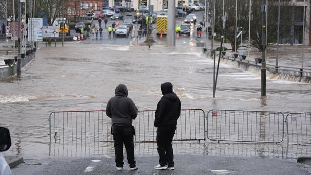 People look at floodwater in Enniscorthy, Co Wexford