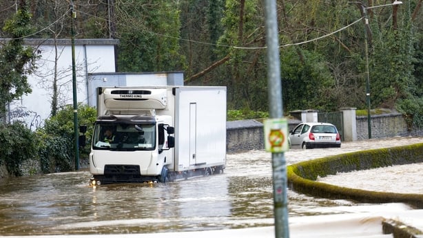 A truck stuck in water following flooding 