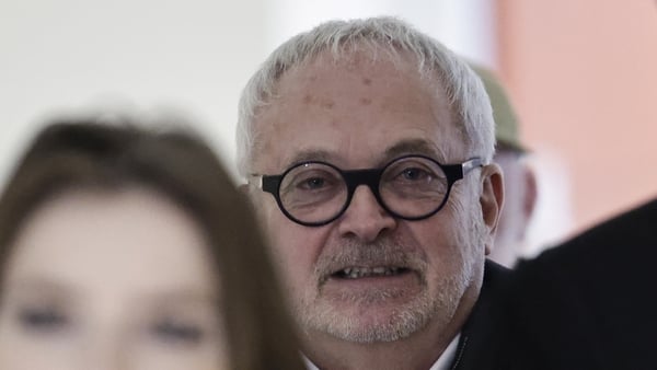 Former French Senator Joel Guerriau arrives in court in Paris