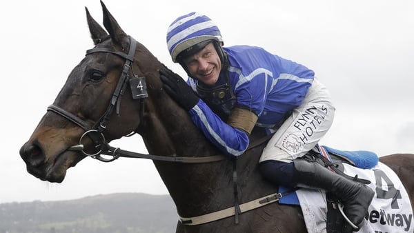 Energumene with Paul Townend riding celebrate after their win in the Champion Chase during racing on day two of the Cheltenham National Hunt jump racing festival at Cheltenham Racecourse on March 15th 2023 in Gloucestershire, England (Photo by Tom Jenkins