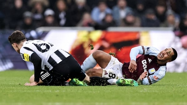 Aston Villa's Youri Tielemans (r) reacts as he is tackled by Newcastle United's Lewis Miley - Premier League, January 2026