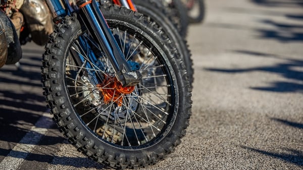 A close up picture of scrambler bike tyres