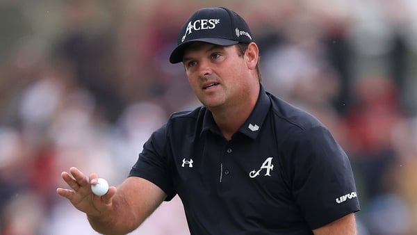 DUBAI, UNITED ARAB EMIRATES - JANUARY 25: Patrick Reed of the United States acknowledges the crowd on the 18th green following victory on day four of the Hero Dubai Desert Classic 2026 at Emirates Golf Club on January 25, 2026 in Dubai, United Arab Emirat