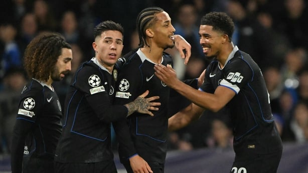 Chelsea's Brazilian striker #20 Joao Pedro (C) celebrates with Chelsea's French defender #29 Wesley Fofana (R)