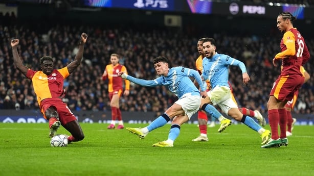 Manchester City's Phil Foden (centre) has a shot blocked by Galatasaray's Davinson Sanchez (left) during the UEFA Champions league