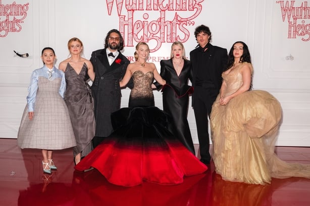 HOLLYWOOD, CALIFORNIA - JANUARY 28: (L-R) Hong Chau, Alison Oliver, Shazad Latif, Margot Robbie, Emerald Fennel, Jacob Elordi, and Charli XCX attends "Wuthering Heights" World Premiere at TCL Chinese 6 Theatres on January 28, 2026 in Hollywood, California. (Photo by David Jon/Getty Images to Warner 