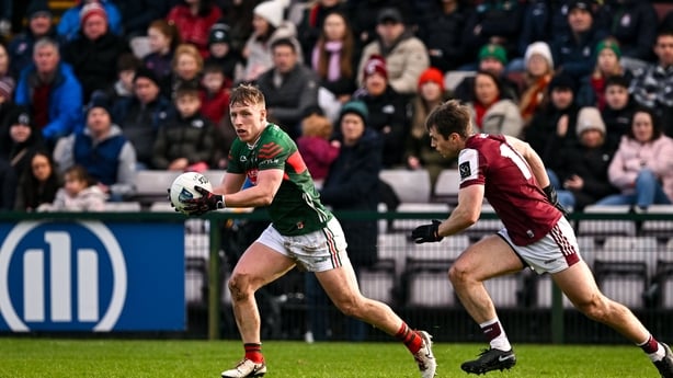 Ryan O'Donoghue of Mayo (L) in action against Liam Silke of Galway - 2026 Allianz Football League